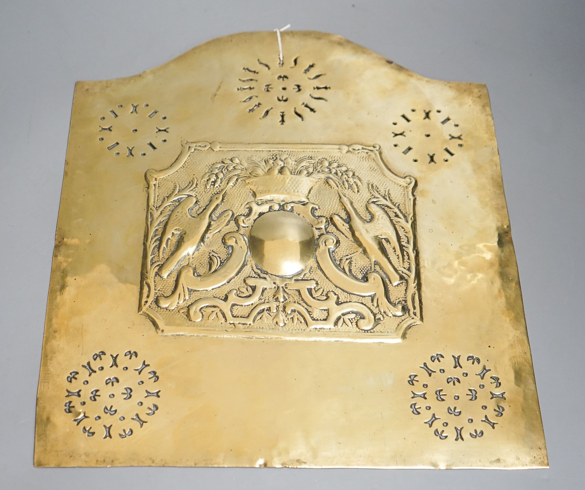 A Georgian pierced and embossed brass plate/panel, 37x32cm
